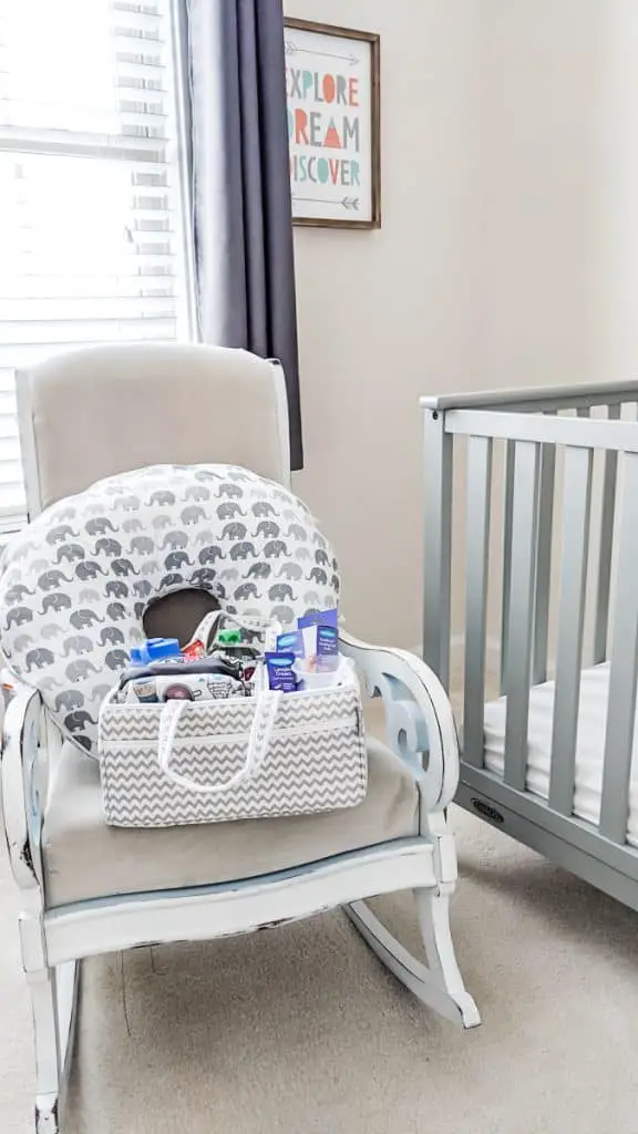 breastfeeding caddy on rocking chair with nursing pillow to make the perfect breastfeeding station