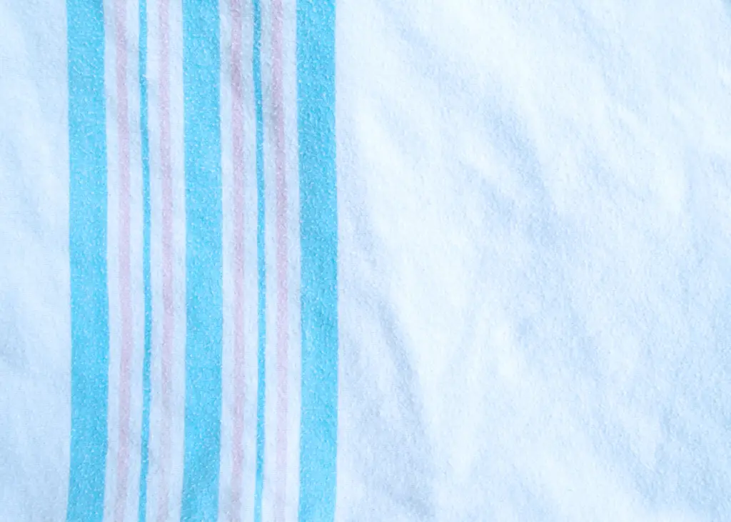white hospital receiving blanket with blue and pink stripes