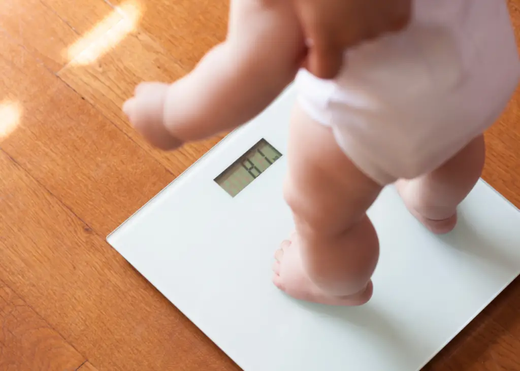 weighing baby at home using a regular scale