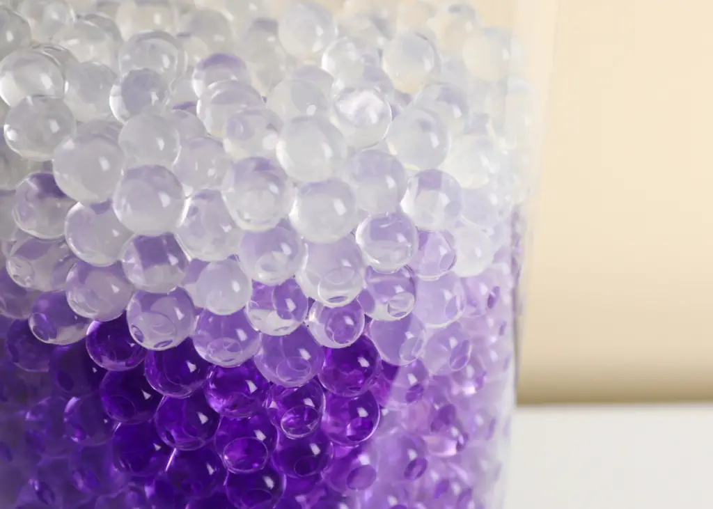 purple ombre Orbeez water beads in a vase for decorative purposes