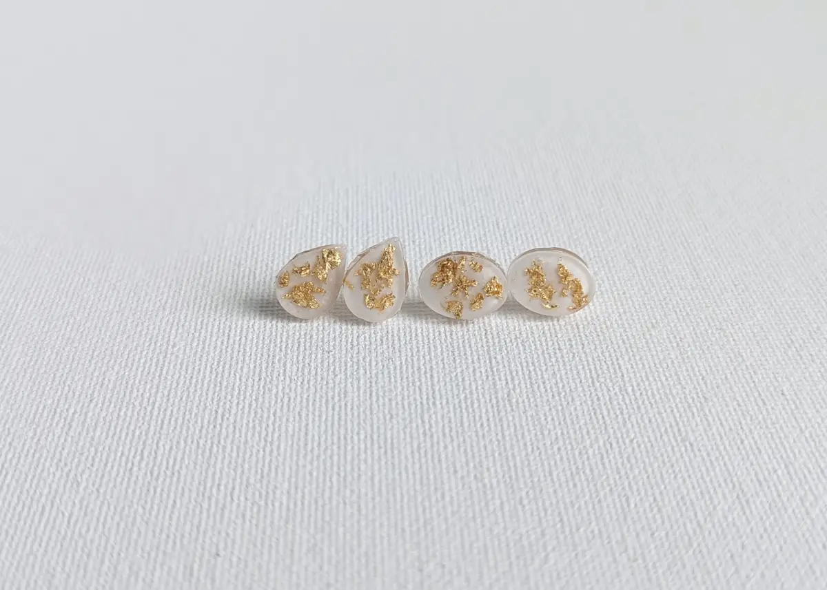 breast milk jewelry tear drop and oval earrings with gold flakes