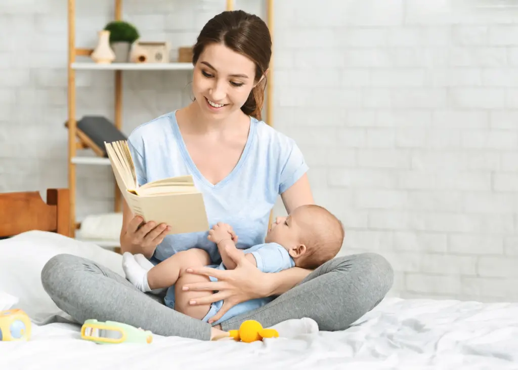 new mom reading to her newborn baby for things to do in the summer