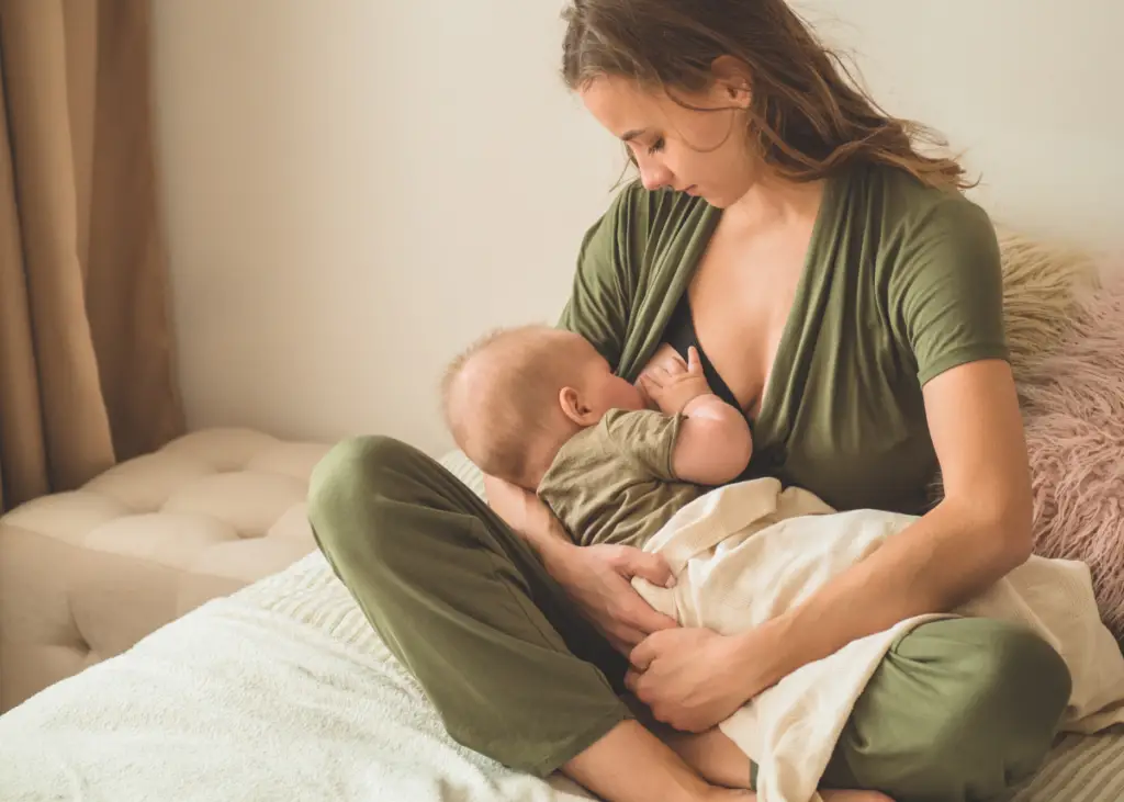 new mom breastfeeding baby