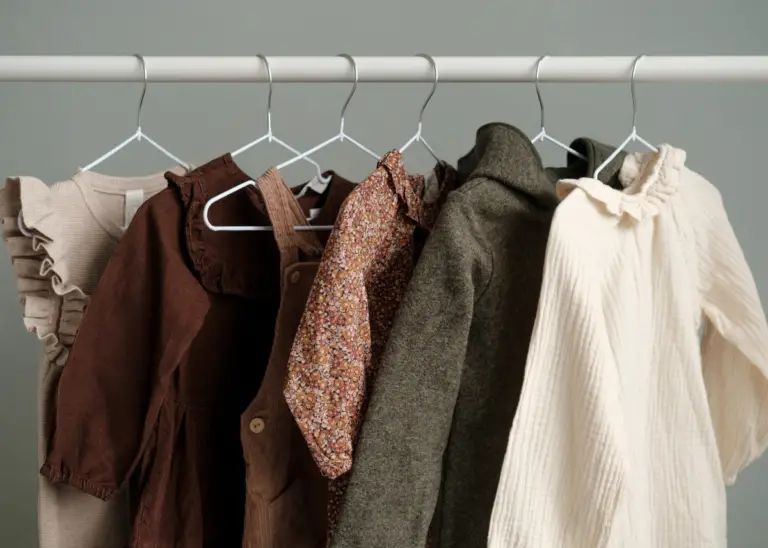 rack of clothes in the size that comes after 5T