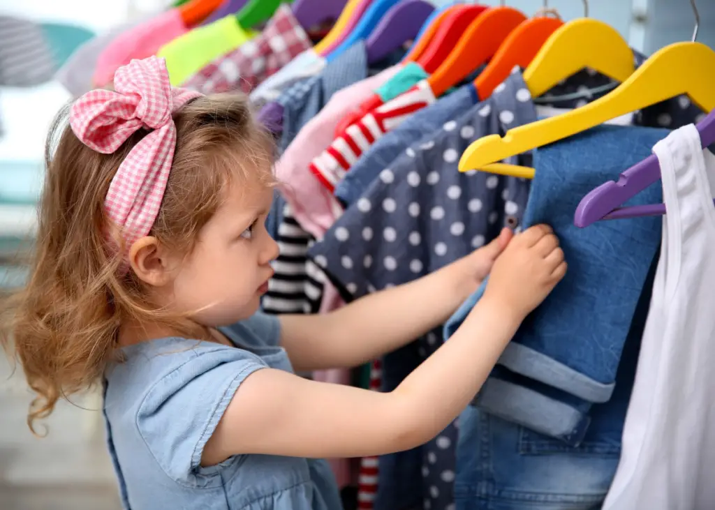 little girl shopping for clothes that comes after size 5T